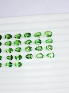 พลอย tavorite ธรรมชาติ55ชิ้นความเงางามสูงสีเขียวสดใส IGI - Product Image 4