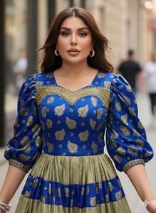 Sophisticated South Asian Couple Wearing Coordinating Royal Blue And Gold Traditional Festive Attire Featuring A Mens Brocade - Product Image 5