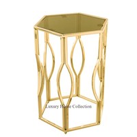 Centre de conception unique de luxe et forme ronde de table d'appoint avec dessus en verre et cadre métallique de haute qualité couleur or brillant poli