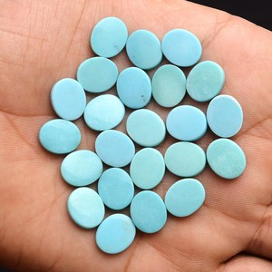 พลอยเทอร์ควอยซ์ AAA+ รูปทรงวงรี ขนาด 8x10 มม. แบบคาโบชอง พลอยเทอร์ควอยซ์สีน้ำเงินธรรมชาติจากแอริโซนา พลอยกึ่งมีค่าแบบแผ่นกลมสำหรับทำเครื่องประดับ - Product Image 1