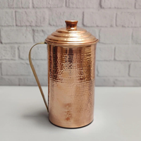 Carafe en cuivre artisanale, surface polie, design classique, couvercle inclus, haute qualité, écologique, personnalisable
