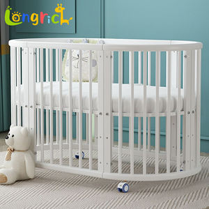 Lit bébé musical convertible 3-en-1 en <span class=keywords><strong>bois</strong></span> naturel, lits bébé ronds et ovales pour bébés et enfants, articles pour bébés - Product Image 1