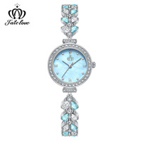Montre à quartz de luxe pour femme, bracelet queue de sirène en alliage, cadran bleu, lunette étincelante en acier inoxydable, idéale pour le quotidien, cadeau
