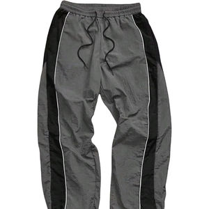 Pantalons de survêtement streetwear à la mode, impression de logo personnalisée, coupe ample, pantalon large pour homme, pantalon en nylon ample pour homme - Product Image 1