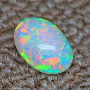 พลอยโอปอลทรงไข่ทรงหลวมเกรด a.a ของเเท้อัญมณีหลากสีรุ้งเรียบแวววาวเกรด a.a ของแท้ - Product Image 1