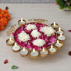 Cuenco Urli rústico de herencia luminosa con Diya para un ambiente divino Calidez rústica: cuenco Urli con Diya para una iluminación pacífica - Product Image 1