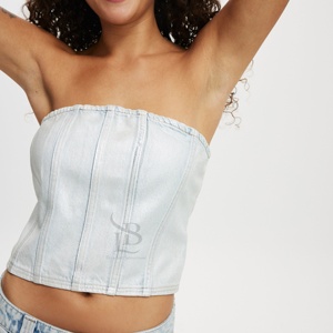 เสื้อผู้หญิงแฟชั่นผ้ายีนส์สไตล์เกาหลีผ้าคอตตอนคุณภาพสูงเสื้อสตรีลำลองดีไซน์ไขว้แบบพิมพ์สีไม่ซ้ำใคร - Product Image 1