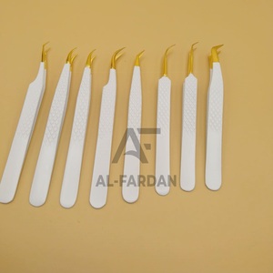 Vente en gros de pinces à cils en acier inoxydable avec logo personnalisé Poignée en diamant avec isolation droite incurvée Pointe pointue en or - Product Image 1