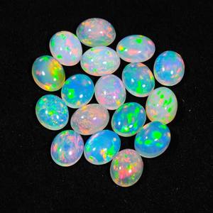 Cabujones de ópalo de fuego etíope natural, piedras preciosas de grado superior de 5x7mm de 5000 quilates para la fabricación de joyas, mayorista Jaipur Mehrajudin - Product Image 6