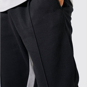 Top Trending 2025 Custom Sports Jogger Pantalones de chándal apilados Venta al por mayor Pantalones de chándal Flare Jogger para hombres pantalones lavados - Product Image 3