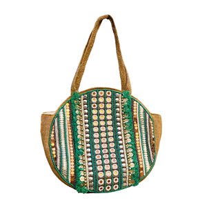 Vente en gros de fourre-tout bohème chic grand sac à main de plage en jute avec pompon et pompon accessoires de mode pour femmes, y compris une longue fermeture éclair - Product Image 1