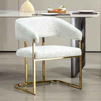 Chaise de salle à manger avec dossier incurvé et bras et assise rembourrée en tissu mélangé de chenille et jambe dorée pour salle à manger salon