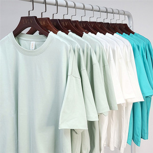 À la mode 205gsm 100% coton lâche plaine vierge filles courte longueur T-shirt imprimé Oem logo femmes haut T-shirt pour hommes - Product Image 1