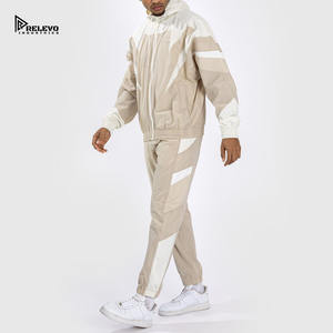 ชุดวอร์มกันลมแบบมีฮู้ดสำหรับฤดูหนาว ขนาดสวมใส่สบาย  แบบลำลอง  สำหรับผู้ชายและผู้หญิง  สองชิ้น  ขายส่ง ปี 2026  กันลม ระบายอากาศได้ดี - Product Image 1