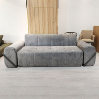 Canapés minimalistes gris en chenille, gain de place, avec structure métallique fixe pour salon