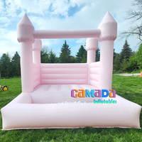 Château gonflable commercial rose pastel en PVC, avec piscine à balles, idéal pour les fêtes et les mariages