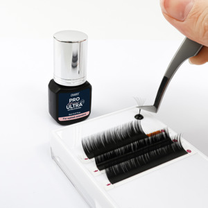 Pegamento transparente CharmLash de alta calidad adhesivo para pestañas personalizado 120-150 Cps líquido para extensiones de pestañas a prueba de agua y aceite - Product Image 1