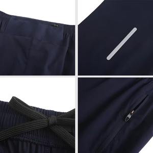 กางเกงผ้าใบแห้งเร็วของผู้ชายระบายอากาศน้ำหนักเบาพร้อมการพิมพ์ถ่ายเทความร้อนการออกแบบสไตล์ฟิตเนสวิ่งช้า - Product Image 5