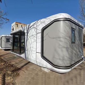 Casa Cápsula Espacial de Acero y Madera con Diseño Inteligente e Innovador |   Cabaña Modular Prefabricada de Lujo para Campamentos Modernos - Product Image 1