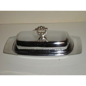 Elegante plato de mantequilla de acero inoxidable decorativo único perfecto para aquellos que quieren una pieza de cocina sofisticada y atemporal - Product Image 1