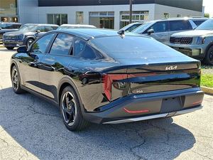 DOUX UTILISÉ 2025 K-4 CONTINUOSLY SEDAN FWD BLACK PEARL - Product Image 6