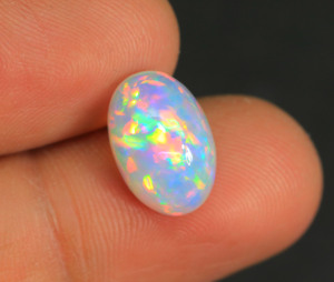 Genuine Ethiopian Opal Gemstone Oval Shape Smooth Polished Rainbow Flashy Ethiopian Opal Cabochon Best for Making Jewelry - Product Image 1