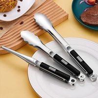 Pince moderne en métal couleur noir et argent, idéale pour les ustensiles de cuisine, la maison et les outils et gadgets de table.