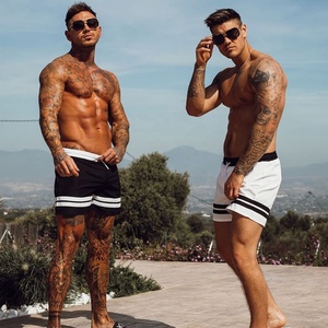 กางเกงว่ายน้ำขาสั้นแห้งเร็วสีเหลืองสำหรับผู้ชายกางเกงว่ายน้ำแบบผูกเอวกางเกงรัดรูปสำหรับเล่นกีฬากางเกงลำลองลายทางด้านข้างสำหรับใส่ไปทะเล - Product Image 2