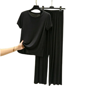 Suministro a granel de ropa de mujer, conjunto informal de dos piezas de Color sólido, estampado de logotipo personalizado, cuello redondo, manga corta, Top y pantalones, trajes - Product Image 4