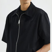 Chemise décontractée unie à manches courtes pour homme, 100 % coton, anti-plis, respirante, écologique, col en V satiné, revers surdimensionné, fermeture éclair, avec impression de logo