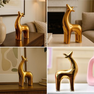 รูปปั้นกวางเรนเดียร์สีทองที่สง่างามของตกแต่งโต๊ะตามเทศกาลเหมาะสำหรับการตกแต่งบ้านการตั้งค่ากิจกรรมคริสต์มาสหรือการตกแต่งสำนักงาน - Product Image 4