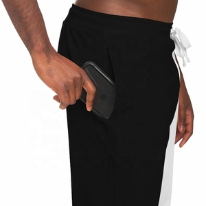 Pantalons de jogging en molleton doux les plus vendus pour hommes et femmes, coupe décontractée, pour la détente, la gym et l'entraînement, avec design à revers élastiques. - Product Image 5