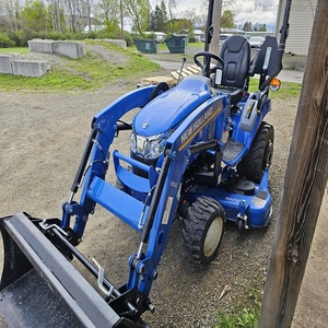 Tracteur agricole New Holland Work-Master 25S 4x4 à chenilles avec chargeur frontal et rétrocaveuse, moteur diesel 4 temps 24 CV - Product Image 1