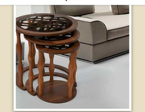 Natural wood <b>nesting</b> <b>tables</b> in various sizes and heights for functional layering and versatile furniture use - Product Image 2