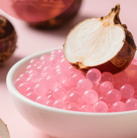 Perles éclatantes de boba instantanées saveur châtaigne d'eau rose, ingrédients populaires pour desserts au bubble tea, garniture sucrée et juteuse pour boissons