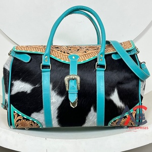 กระเป๋าทรงดัฟเฟิลกระเป๋าเดินทางหนังวัวแท้สำหรับผู้หญิงกระเป๋าหนังเครื่องมือสำหรับเดินทางข้ามคืนโลโก้แบบออกแบบได้ตามต้องการขนาดใหญ่ - Product Image 1