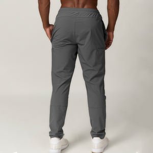 Pantalones deportivos de gimnasio informales ajustados para hombre, pantalones de chándal de nailon de secado rápido transpirables con logotipo personalizado, primavera sólida 100% poliéster - Product Image 2