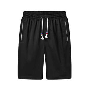 Pantalones cortos de entrenamiento de gimnasio con entrepierna de 7 pulgadas para hombre con bolsillos de patrón sólido informal de tela elástica alta para soporte adicional entrenamiento para correr - Product Image 1