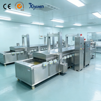 Machine à frire entièrement automatique pour nuggets de poulet et galettes de viande avec fonction de filtration d'huile pour usine de transformation de produits carnés