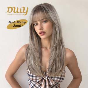วิกผมสังเคราะห์แบบไม่ต้องใช้กาว ยี่ห้อ Jami รุ่น DWY Bionic Silk Top คุณภาพสูง ยาว 22 นิ้ว ทรงเลเยอร์คัท สีบรอนด์บาเลยาจ พร้อมหน้าม้า สำหรับผู้หญิง สินค้ามาใหม่ - Product Image 1