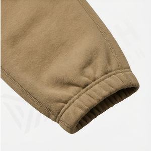 กางเกงแทร็คผ้าฝ้ายออร์แกนิคเนื้อหนาทรงหลวมเอวกลางแบบทำเก่าสำหรับผู้ชาย พร้อมแผ่นปะ ดีไซน์ทนทาน คุณภาพพรีเมียม - Product Image 6
