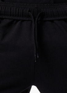 Vente en gros de shorts de gym de couleur noire en jersey pour hommes OEM avec logo personnalisé shorts d'entraînement en coton respirant et extensible fournisseur de vêtements de sport - Product Image 4