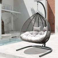 Fauteuil suspendu en rotin de style moderne en forme d'œuf de la marque DL Furniture avec coussin imperméable pour hôtel, extérieur et jardin