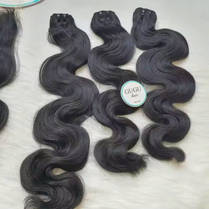 Extensiones de cabello humano vietnamita 100% Paquetes de ondas corporales dibujadas dobles con encaje transparente frontal - Product Image 1