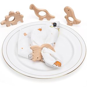 Rond de serviette dinosaure en bois fait à la main décor de table en forme d'animal mignon pour les fêtes de bébé - Product Image 1