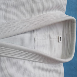 Karate Gi negro personalizado con costuras blancas 100% algodón Unisex hecho en Pakistán de alta calidad - Product Image 1