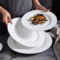 Assiette plate ronde en céramique blanche pure pour la cuisine occidentale, steak, collation, gâteau, assiette de restaurant, assiette à dessert, personnalisable