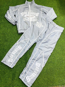 OEM Logo personnalisé Survêtement de jogging en nylon réfléchissant Ensemble de survêtement coupe-vent pour homme Rayures blanches pour homme - Product Image 2