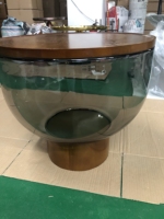 Table basse moderne convertible 2026 avec structure en fer et plateau en verre trempé, idéale pour salon et salle à manger