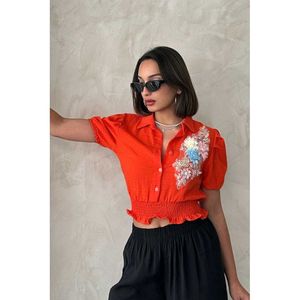 Chemisiers élégants en lin orange à motifs floraux sur la poitrine pour femmes Topshow, vente en gros - Product Image 5